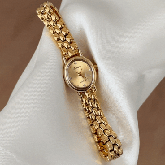 Elegant Gold Oval Dial Alloy Bracelet Watch - Daily Wear Edition