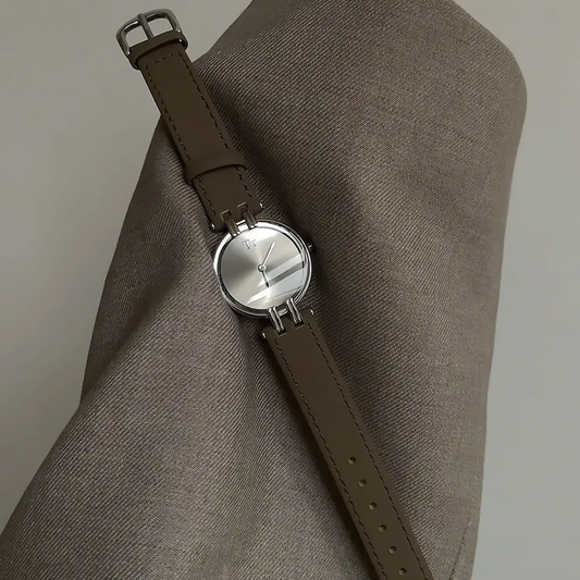 Sophisticated Gray Timepiece: Round Silver Dial Leather Quartz Watch