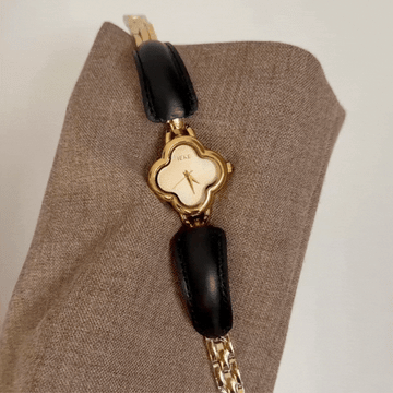 Vintage Charm: Gold Four-Leaf Clover Dial Watch with Gold Clover Bezel & Black Leather Strap