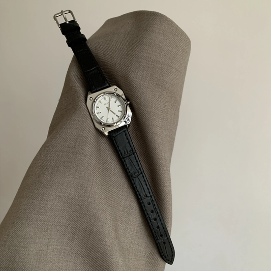 Sleek Elegance Timepiece: Black Leather Silver Case White Dial Watch