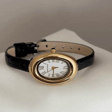 Refined Chic Elegant: White Oval Dial Watch with Gold Bezel & Black Leather Strap