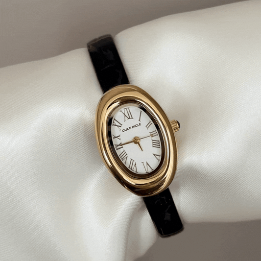 Refined Chic Elegant: White Oval Dial Watch with Gold Bezel & Black Leather Strap