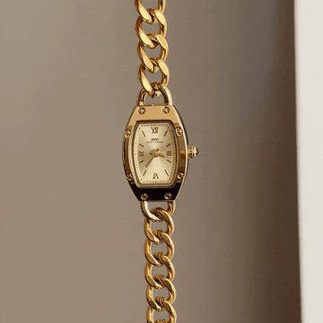 Vintage Curves: Gold Tonneau Dial Watch with Gold Stainless Steel Chain Bracelet