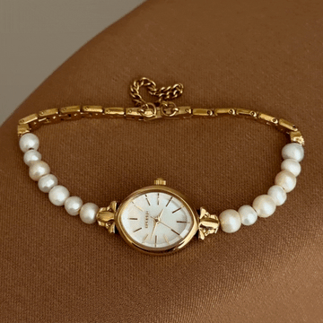 Sophisticated Oval Pearl & Gold Watch with White Dial and Dual-Tone Bracelet