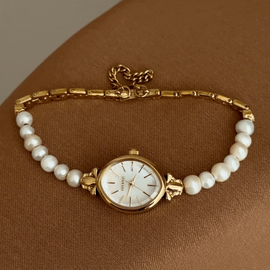 Sophisticated Oval Pearl & Gold Watch with White Dial and Dual-Tone Bracelet