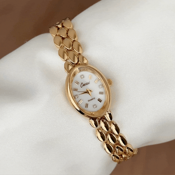 Warm Gold Elegant: White Oval Dial Watch with Gold Oval Bezel & Matching Bracelet