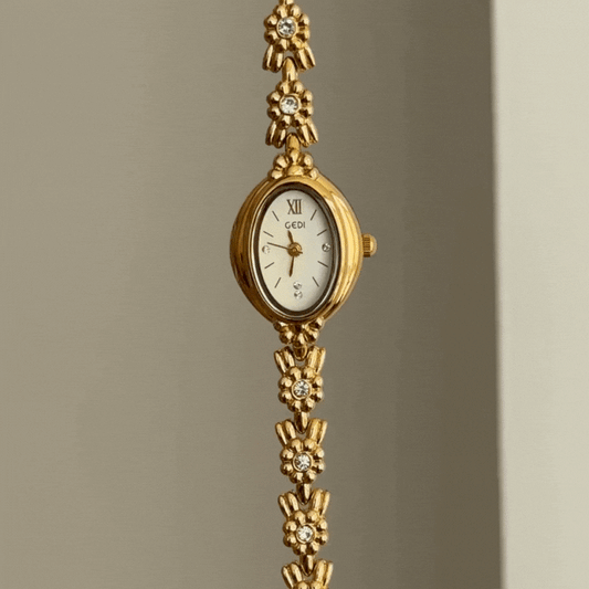 Modern Elegance White Oval Dial Gold Diamond Bezel & Bracelet Watch