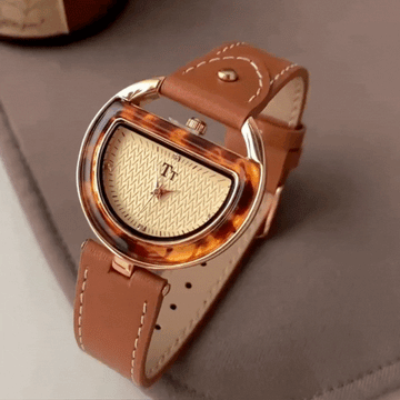 Amber Eclipse Timepiece: Leather Half-Moon Quartz Watch