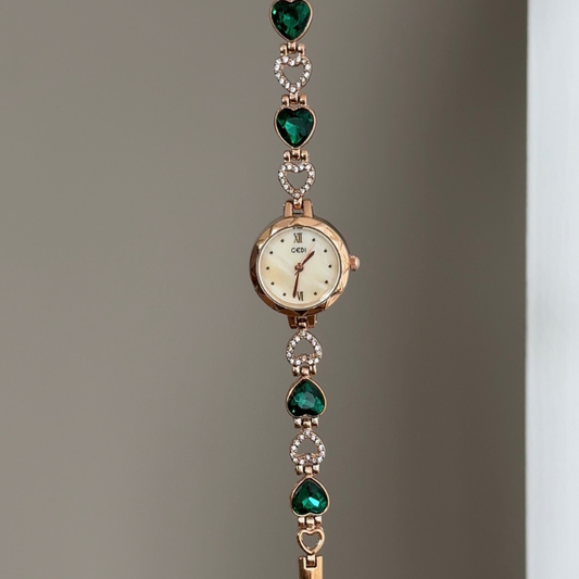 Everyday Elegance: Rose Gold Round Dial Watch with Rose Gold Bezel & Green Gemstone-Accented Rose Gold Alloy Bracelet