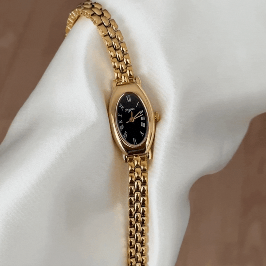 Gold-Tone Alloy and Black Oval Dial Quartz Watch for Women - Elegant Style
