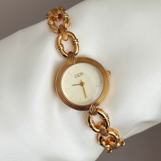 Textured Chic: Gold Round Dial Watch with Gold Denim-Textured Alloy Bracelet