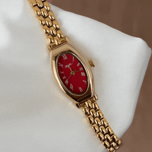Stylish Red Oval Dial Gold-Tone Watch - A Vintage Bold Statement for Women