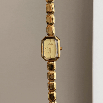 Luxe Modern: Gold Rectangular Dial Watch with Cut Square Link Bracelet