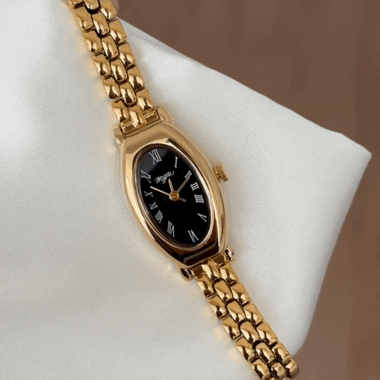 Gold-Tone Alloy and Black Oval Dial Quartz Watch for Women - Elegant Style