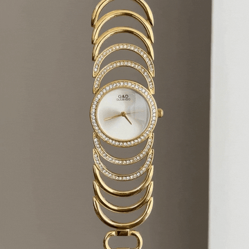 Feminine Refined Elegance: White Diamond Dial Watch with Gold Diamond Bezel & Bracelet