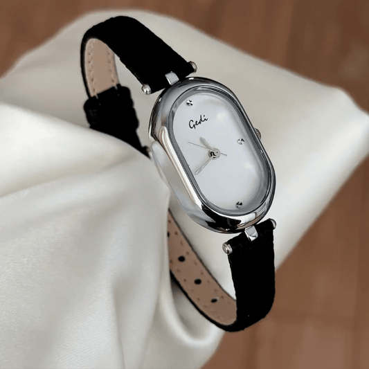 Modern Elegance: White Elongated Oval Dial Watch with Silver Bezel & Black Microfiber Leather Strap