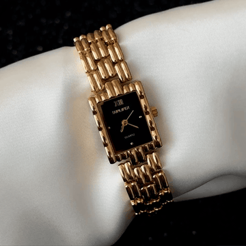 Gilded Sophistication: Black Rectangular Dial Watch with Gold Bezel & Stainless Steel Bracelet