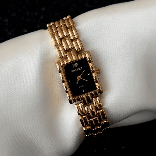 Gilded Sophistication: Black Rectangular Dial Watch with Gold Bezel & Stainless Steel Bracelet