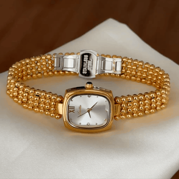Classic Grace Elegant: White Oval Dial Watch with Gold Bezel & Stainless Steel Bracelet