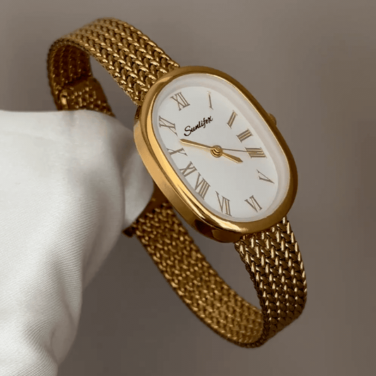 Warm Elegant: White Oval Dial Watch with Gold Wheat Pattern Stainless Steel Bracelet