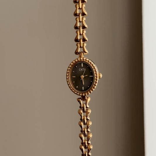 Luxe Shine: Green Oval Dial Watch with Gold Alloy Chain Bracelet
