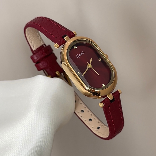 Elongated Sophistication: Red Elongated Oval Dial Watch with Gold Bezel & Red Microfiber Strap