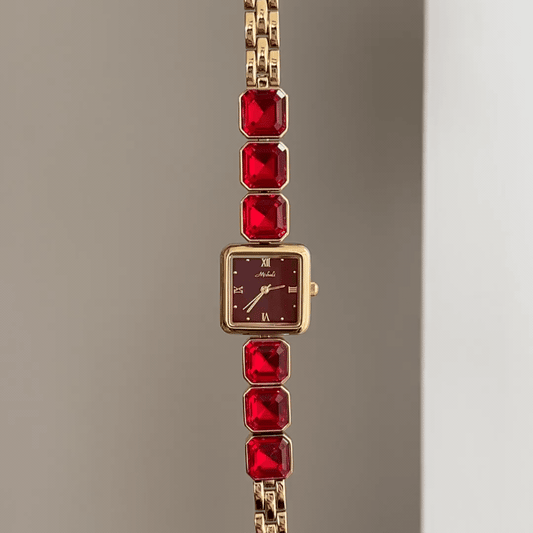 Gilded Jewelry: Red Square Dial Watch with Gold Square Bezel & Ruby-Set Gold Chain Bracelet