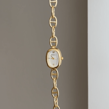 Openwork Art: White Oval Dial Watch with Gold Oval Bezel & Gold Openwork Steel Bracelet