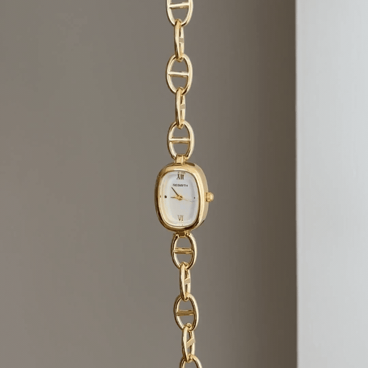 Openwork Art: White Oval Dial Watch with Gold Oval Bezel & Gold Openwork Steel Bracelet