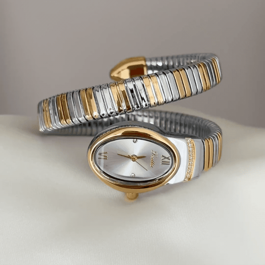 Dual-Tone Loop: Silver Oval Dial Watch with Gold Bezel & Alternating Two-Tone Loop Steel Bracelet