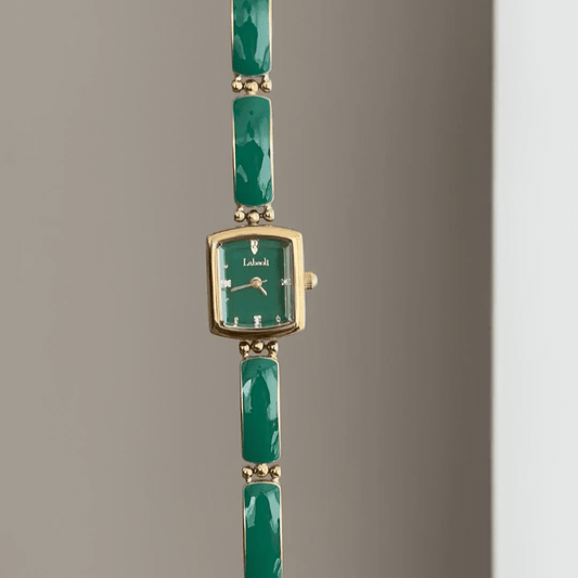 Gemstone Sparkle: Green Square Dial Watch with Gold Square Bezel & Green Gemstone-Set Gold Bracelet