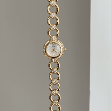 Openwork Airy: White Round Dial Watch with Gold Diamond Bezel & Gold Alloy Openwork Bracelet