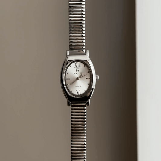 Versatile Elegance: Silver Oval Dial Watch with Silver Bezel & Stainless Steel Bracelet