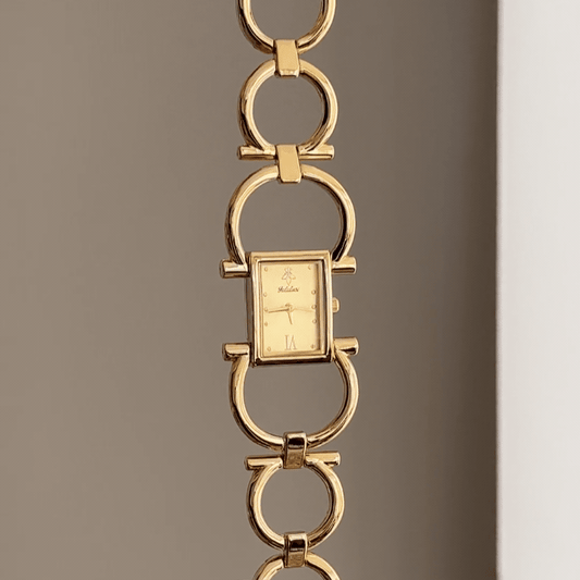 Jewelry Glamour: Gold Rectangular Dial Watch with Gold Chain Bracelet