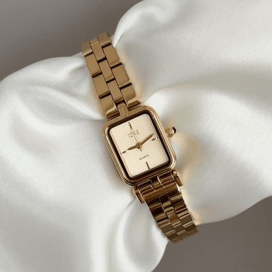 Sleek Geometry: Gold Rectangular Dial Watch with Matching Bezel & Gold Stainless Steel Bracelet