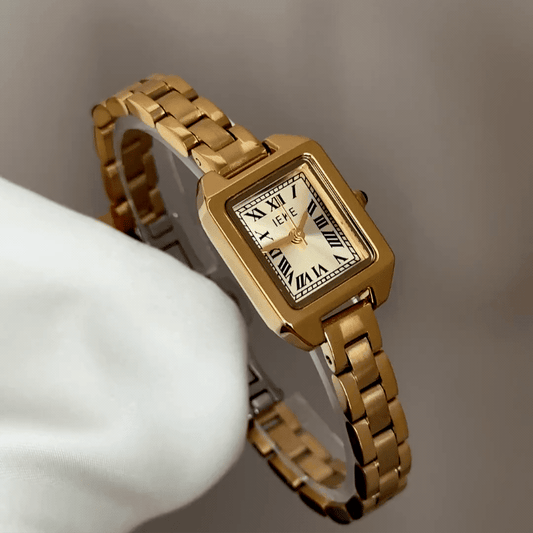 Geometric Chic: Gold Rectangular Dial Watch with Gold Stainless Steel Bracelet