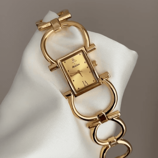 Jewelry Glamour: Gold Rectangular Dial Watch with Gold Chain Bracelet