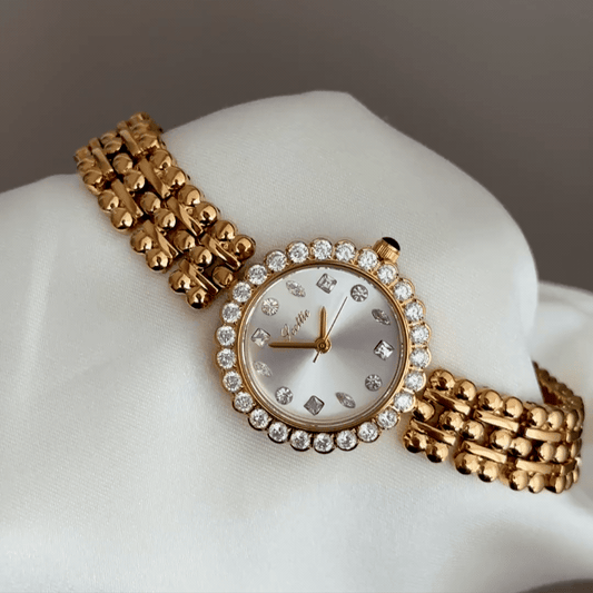 Luxury Elegant: White Round Dial Watch with Gold Gemstone Bezel & Stainless Steel Bracelet