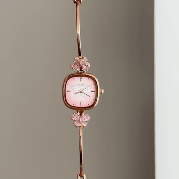 Rose Gold Glow: Pink Rectangular Dial Watch with Matching Bezel & Rose Gold Cuff Bracelet
