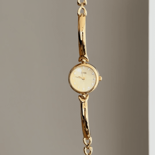 Monochrome Gold: Gold Round Dial Watch with Matching Bezel & Bracelet