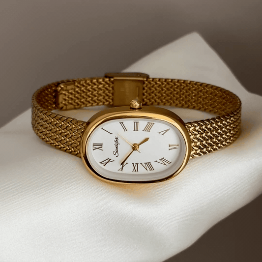 Warm Elegant: White Oval Dial Watch with Gold Wheat Pattern Stainless Steel Bracelet