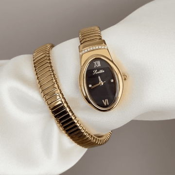 Gilded Shadow: Black Serpent-Head Dial Watch with Gold Bezel & Gold Loop Cuff Bracelet