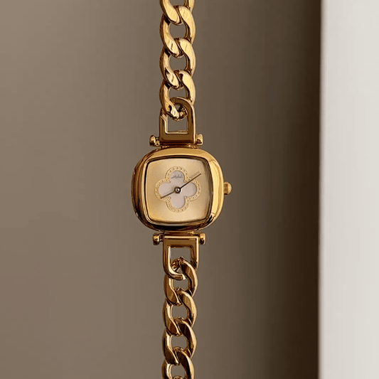 Gilded Elegance: Gold Oval Dial Watch with Gold Chain Bracelet