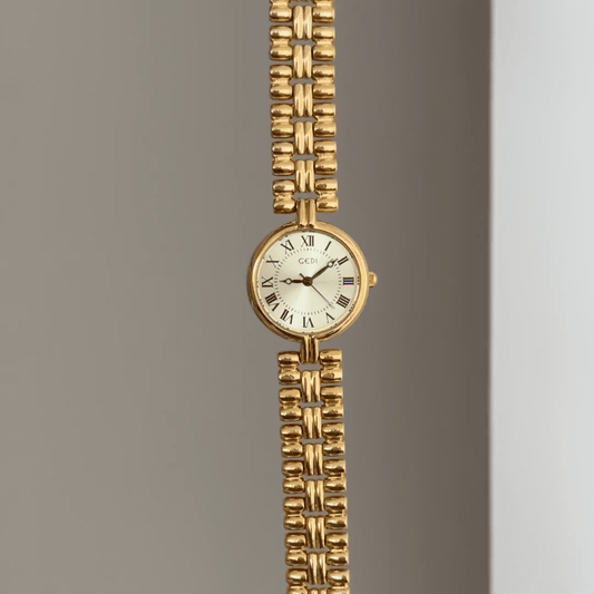 Warm Radiance: Gold Round Dial Watch with Gold Bezel & Gold Alloy Bracelet