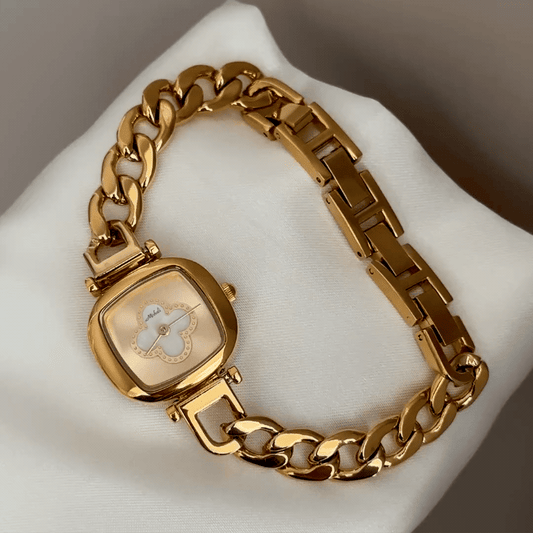 Gilded Elegance: Gold Oval Dial Watch with Gold Chain Bracelet