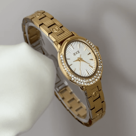 Versatile Elegant: White Oval Dial Watch with Gold Diamond Bezel & Gold Stainless Steel Bracelet