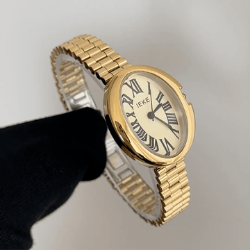 Gold Elegance: Gold Oval Dial Watch with Matching Stainless Steel Bracelet