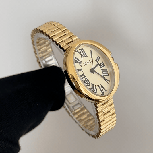 Gold Elegance: Gold Oval Dial Watch with Matching Stainless Steel Bracelet