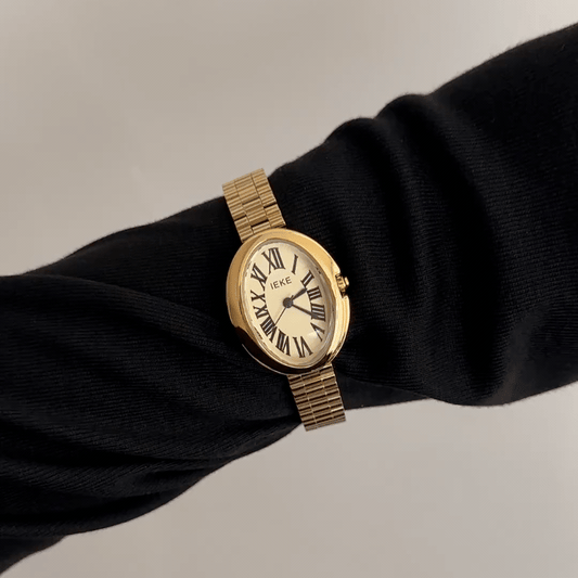 Gold Elegance: Gold Oval Dial Watch with Matching Stainless Steel Bracelet