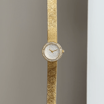 Elegance Chic: White Round Dial Watch with Gold Diamond Bezel & Gold Stainless Steel Bracelet